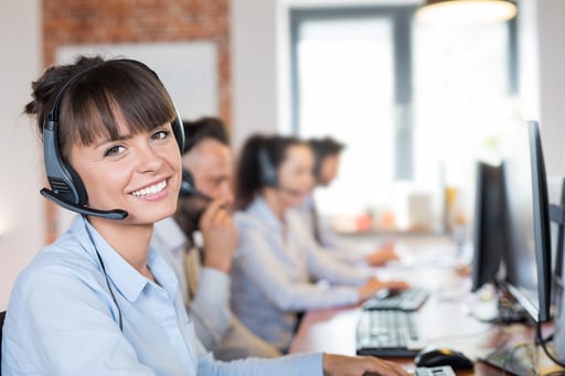 Call-center-worker-accompanied-by-her-team.-922664162_6720x4480 (2)-1