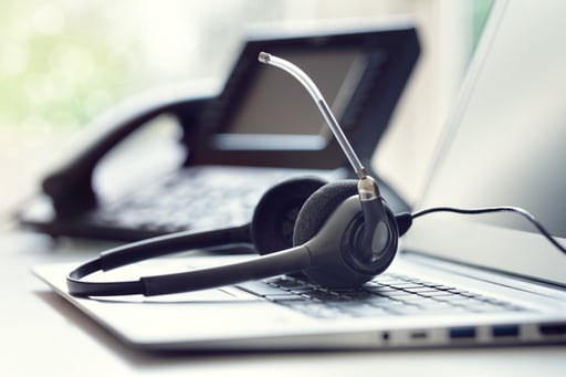 Headset-headphones-telephone-and-laptop-in-call-center-1033711098_8523x5682-4