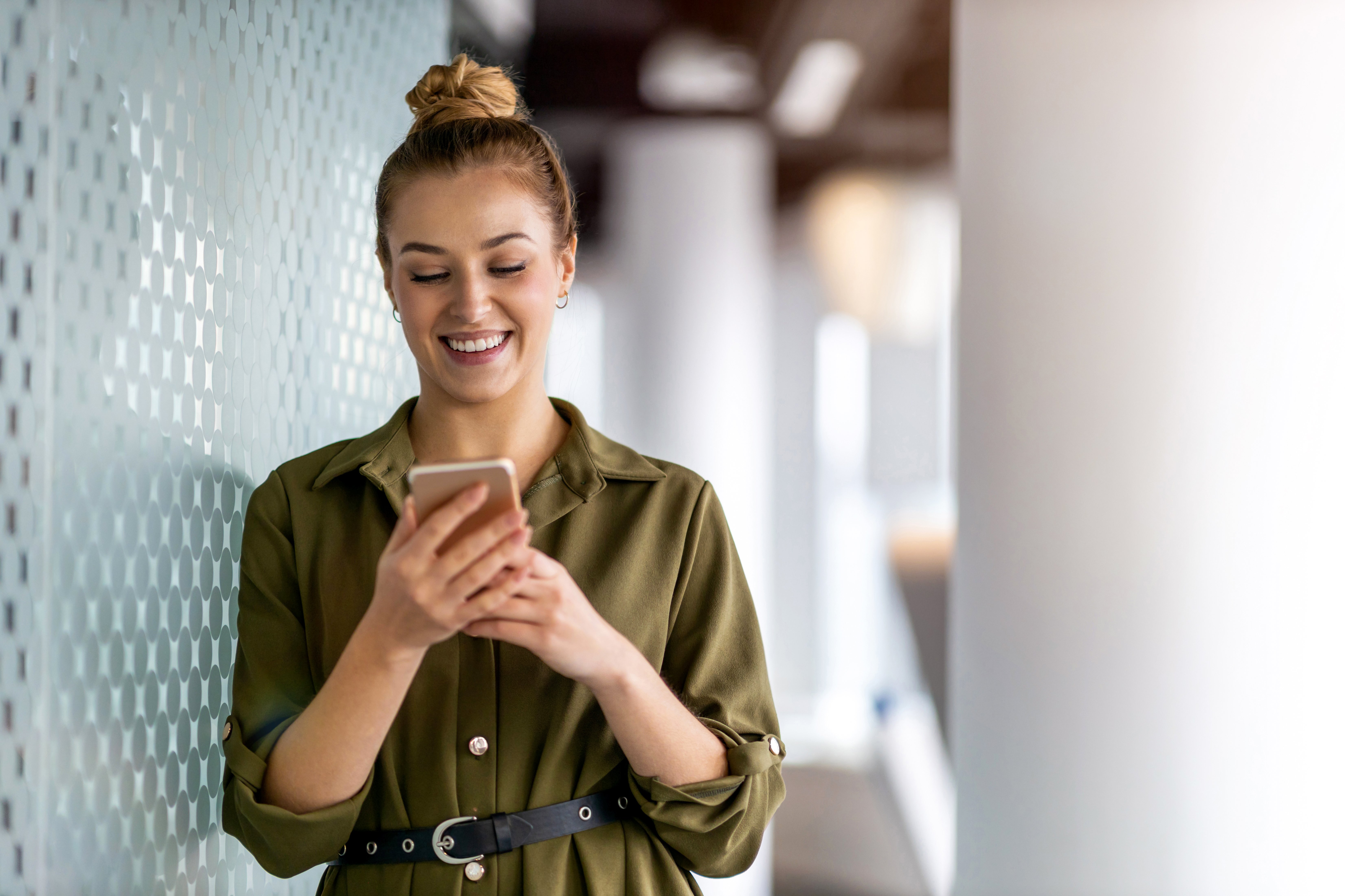 female-european-adult-indoor-as-businesswoman-using-a-smartphone-web-1