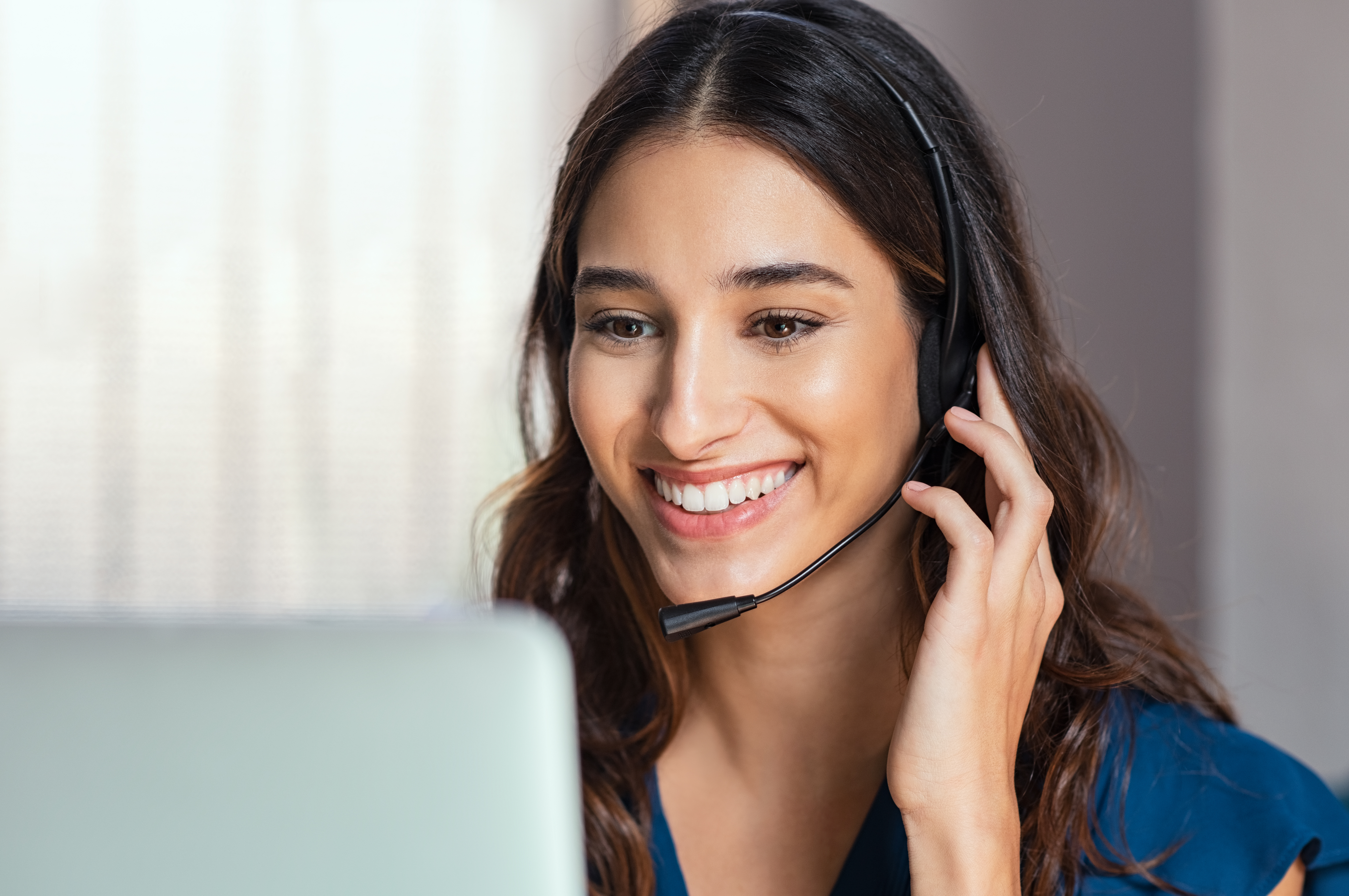 Call-center-operator-with-headphones-1134000841_6144x4080 (2)-2